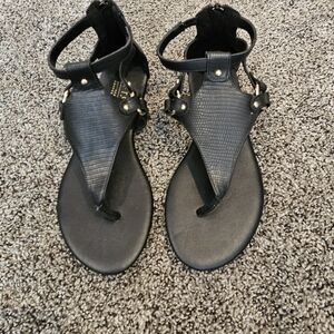 Black and gold sandals